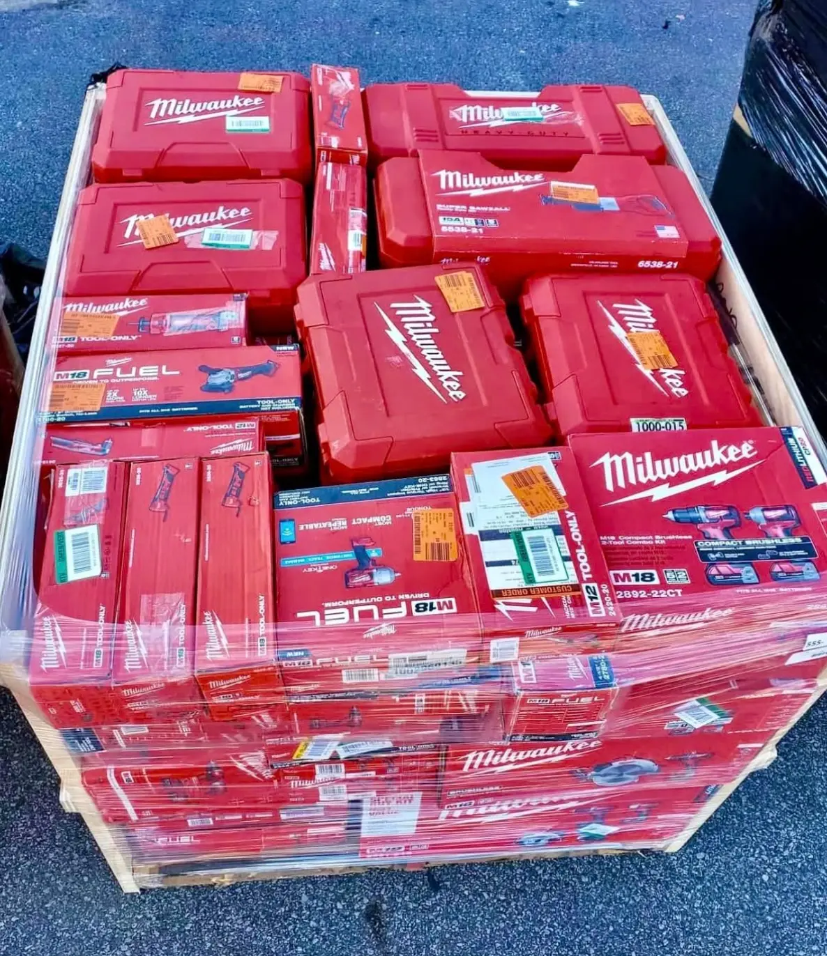 Supplied photograph of Milwaukee tool cartons on a pallet